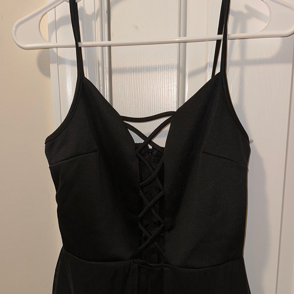 Charlotte Russe high low criss cross front romper